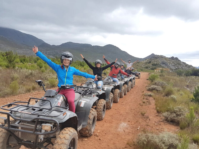 a group of people on a quad biking tour