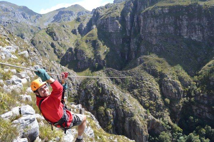 man enjoying a ziplining tour