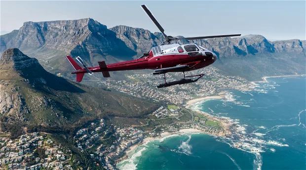 helicopter flying over cape town