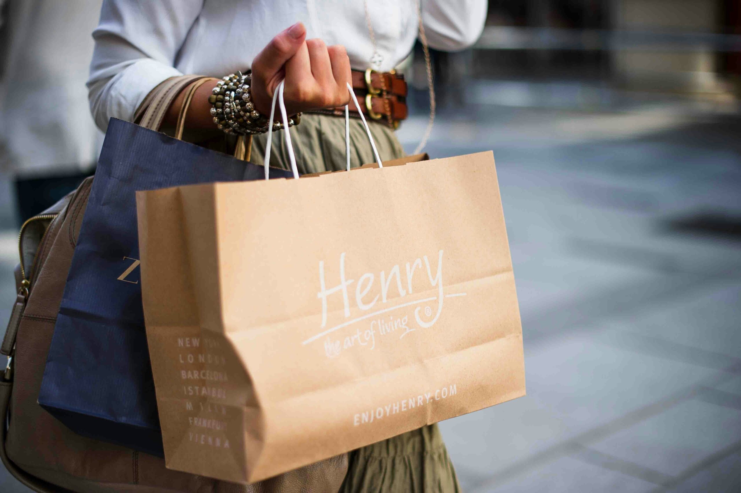 Person holding shopping bag